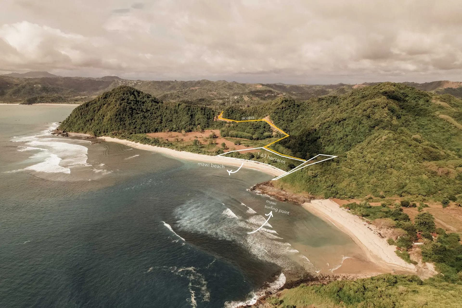 Aerial perspective of Mawi Beach shoreline adjacent to the 3-hectare land for sale.
