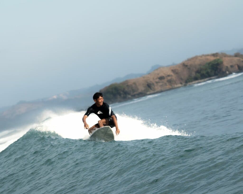Surfing at Gerupuk Bay
