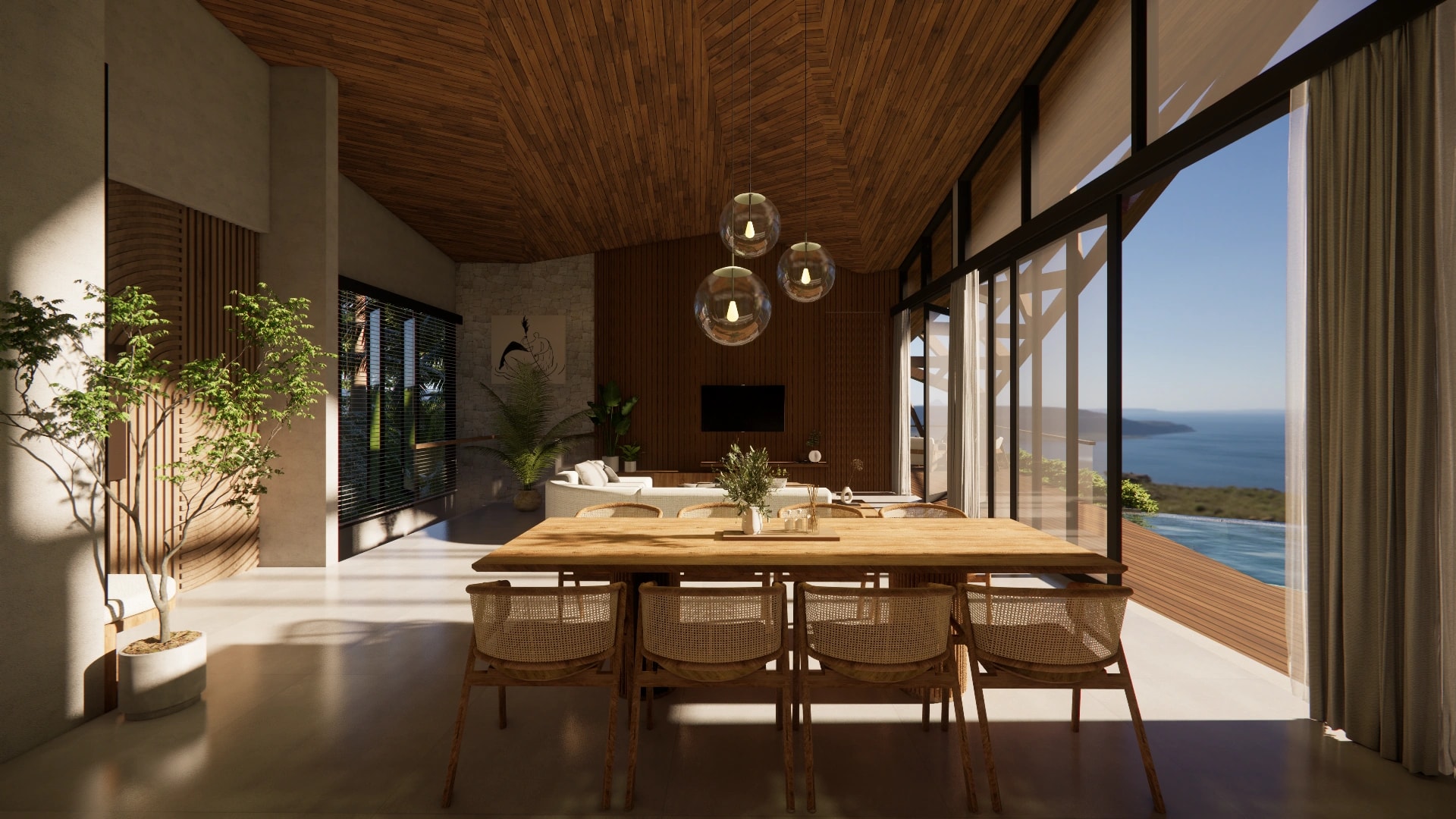 A spacious villa interior with a large wooden dining set, warm timber ceiling panels, and floor-to-ceiling windows overlooking an ocean panorama.