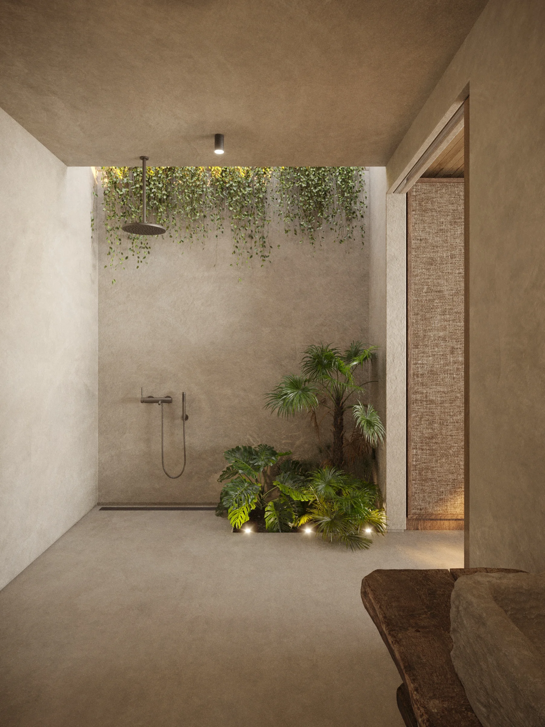 Minimalist open-air shower with concrete walls and built-in indoor greenery.